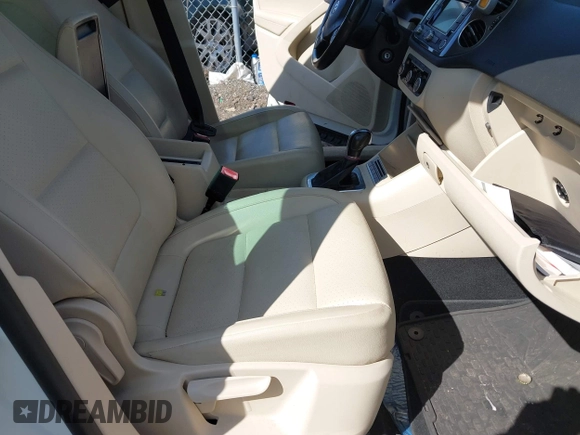 2012 Volkswagen Tiguan S with VIN WVGBV7AX0CW582922, listed as a IAAI auction lot 41906974 with 150,681 mi miles and . Bid and sale history available at DreamBid. Image 5.
