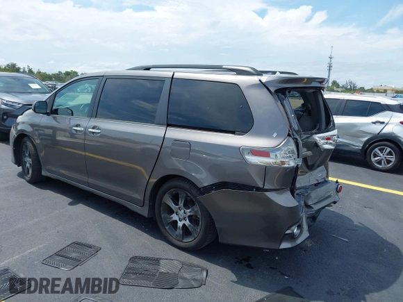 2015 Toyota Sienna SE with VIN 5TDXK3DC2FS552698, listed as a IAAI auction lot 42253119 with 110,710 mi miles and . Bid and sale history available at DreamBid. Image 3.