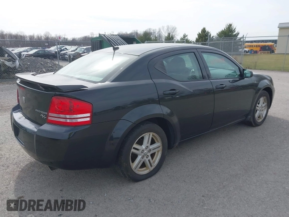 2009 Dodge Avenger SXT with VIN 1B3LC56B49N570157, listed as a IAAI auction lot 41796122 with 164,571 mi miles. Bid and sale history available at carsss.com. Image 4.