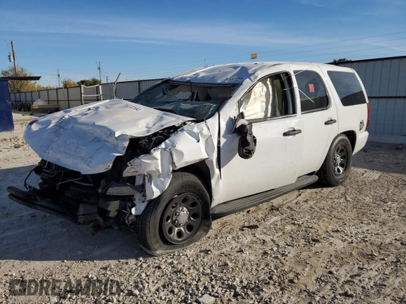 2014 Chevrolet Tahoe Commercial z VIN 1GNLC2E06ER212372, wystawiony jako Copart lot #82332554 z przebiegiem Nie podano mil oraz Szkoda całkowita • Salvage title. Historia ofert i sprzedaży dostępna na DreamBid. Obrazek 1.