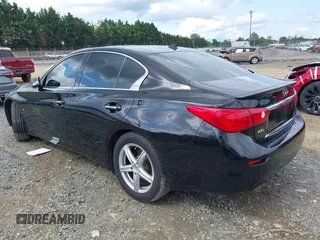 2015 Infiniti Q50 z VIN JN1BV7AR2FM421111, wystawiony jako IAAI lot #42209282 z przebiegiem 128 481 mil mil oraz . Historia ofert i sprzedaży dostępna na DreamBid. Obrazek 3.
