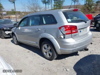 2013 Dodge Journey SE with VIN 3C4PDCAB1DT638223, listed as a IAAI auction lot 41640497 with 155,313 mi miles. Bid and sale history available at carsss.com. Image 3.