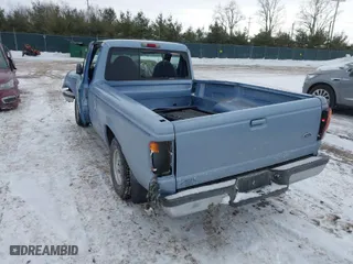 1998 Ford Ranger XL with VIN 1FTYR10U7WUA82148, listed as a IAAI auction lot 41619390 with 0 mi miles. Bid and sale history available at carsss.com. Image 3.