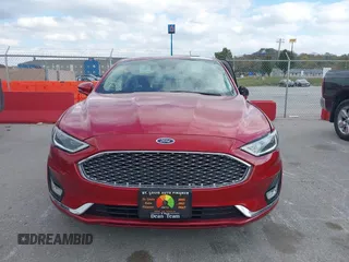 2020 Ford Fusion Hybrid Titanium with VIN 3FA6P0RU7LR156915, listed as a IAAI auction lot 40738652 with 82,836 mi miles. Bid and sale history available at carsss.com. Image 13.