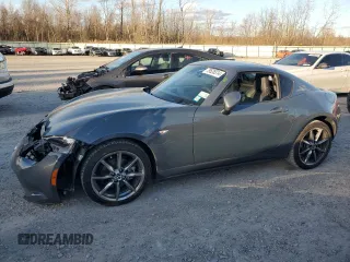 2021 Mazda MX-5 Miata Grand Touring z VIN JM1NDAM75M0452605, wystawiony jako Copart lot #79528314 z przebiegiem 9 177 mil mil oraz Szkoda całkowita • Salvage title. Historia ofert i sprzedaży dostępna na DreamBid. Obrazek 1.
