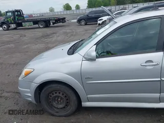 2007 Pontiac Vibe with VIN 5Y2SL658X7Z411431, listed as a IAAI auction lot 42181112 with 167,246 mi miles. Bid and sale history available at carsss.com. Image 14.