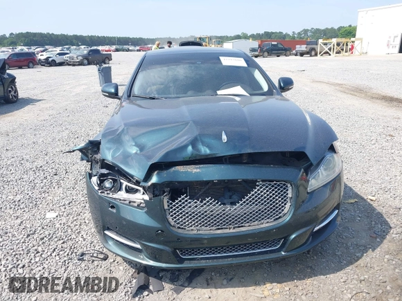 2014 Jaguar XJ Portfolio z VIN SAJWA2GZ4E8V60315, wystawiony jako IAAI lot #42293880 z przebiegiem 97 712 mil mil oraz . Historia ofert i sprzedaży dostępna na DreamBid. Obrazek 6.