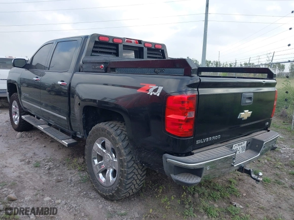 2014 Chevrolet Silverado 1500 LTZ with VIN 3GCUKSECXEG229900, listed as a IAAI auction lot 41962785 with 156,984 mi miles. Bid and sale history available at carsss.com. Image 3.
