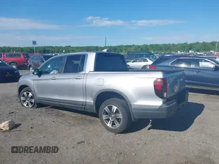 2017 Honda Ridgeline RTL-T z VIN 5FPYK3F64HB022095, wystawiony jako IAAI lot #42219954 z przebiegiem 85 876 mil mil oraz . Historia ofert i sprzedaży dostępna na DreamBid. Obrazek 13.