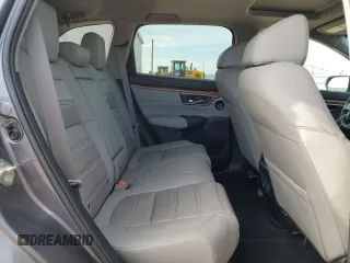 2020 Honda CR-V Touring with VIN 2HKRW2H99LH677964, listed as a Copart auction lot 61169915 with 65,915 mi miles and Salvage title. Bid and sale history available at DreamBid. Image 11.
