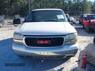 2003 GMC Yukon SLT with VIN 1GKEC13Z83R143232, listed as a IAAI auction lot 41655509 with 148,574 mi miles. Bid and sale history available at carsss.com. Image 6.
