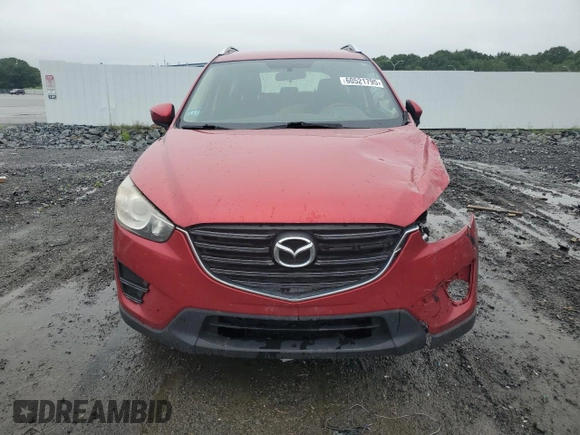 2016 Mazda CX-5 Sport with VIN JM3KE4BY1G0768530, listed as a Copart auction lot 60521795 with 118,132 mi miles and Salvage title. Bid and sale history available at DreamBid. Image 5.