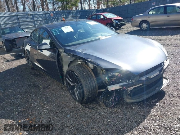 2021 Tesla Model S Long Range with VIN 5YJSA1E52MF428370, listed as a IAAI auction lot 41809773 with 34,372 mi miles and . Bid and sale history available at DreamBid. Image 1.
