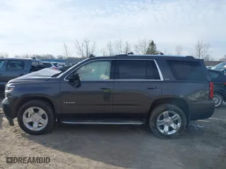 2016 Chevrolet Tahoe LTZ with VIN 1GNSKCKC7GR475458, listed as a IAAI auction lot 41831124 with 95,554 mi miles. Bid and sale history available at carsss.com. Image 14.