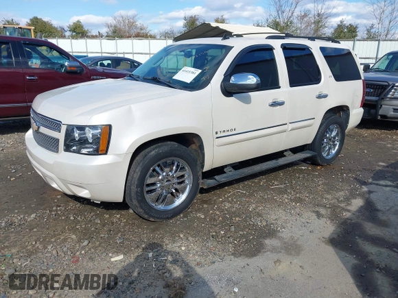 2008 Chevrolet Tahoe LTZ with VIN 1GNFC13J18R263835, listed as a IAAI auction lot 41415381 with 308,477 mi miles and . Bid and sale history available at DreamBid. Image 2.