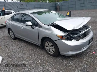 2012 Honda Civic LX z VIN 19XFB2F57CE013066, wystawiony jako IAAI lot #42344054 z przebiegiem 185 986 mil mil oraz . Historia ofert i sprzedaży dostępna na DreamBid. Obrazek 1.