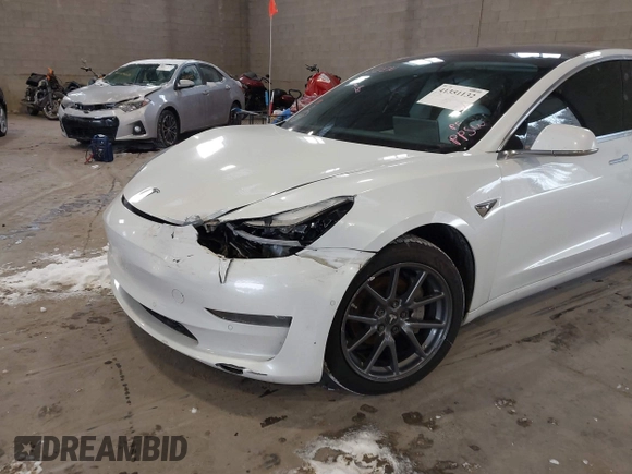 2020 Tesla Model 3 Long Range z VIN 5YJ3E1EB9LF622214, wystawiony jako IAAI lot #41351132 z przebiegiem 133 805 mil mil oraz . Historia ofert i sprzedaży dostępna na DreamBid. Obrazek 6.