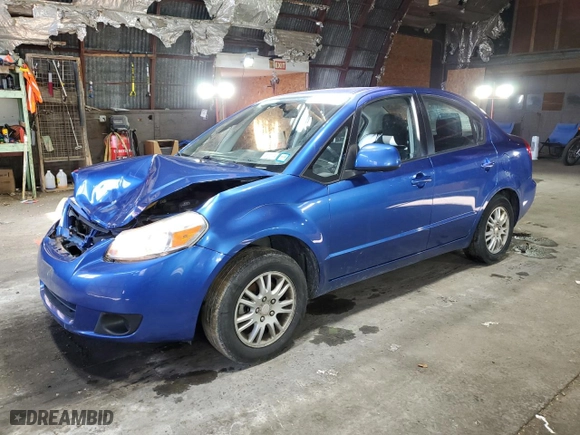 2013 Suzuki SX4 LE with VIN JS2YC5A36D6102850, listed as a Copart auction lot 82205134 with 70,776 mi miles and Salvage Title. Bid and sale history available at carsss.com. Image 1.