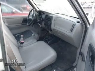 1999 Ford Ranger XL with VIN 1FTYR10V7XPB93324, listed as a IAAI auction lot 41762585 with 214,904 mi miles. Bid and sale history available at carsss.com. Image 5.