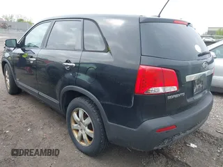 2011 Kia Sorento LX with VIN 5XYKTCA17BG172032, listed as a IAAI auction lot 42227728 with 133,681 mi miles and . Bid and sale history available at carsss.com. Image 3.