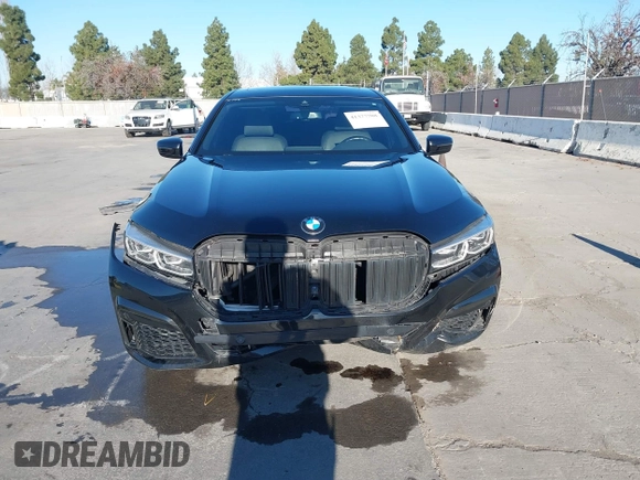 2022 BMW 7 Series 740i with VIN WBA7T2C02NCJ33925, listed as a IAAI auction lot 41377788 with 143,684 mi miles and . Bid and sale history available at carsss.com. Image 12.