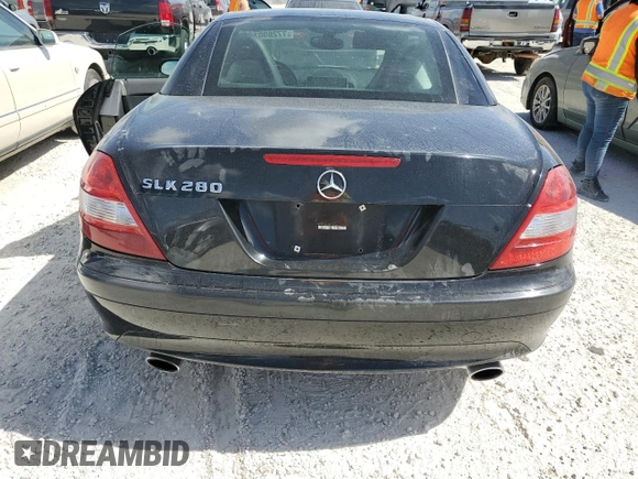2006 Mercedes-Benz SLK-Class 3.0L with VIN WDBWK54F66F102164, listed as a Copart auction lot 77269014 with 135,786 mi miles and Salvage Title. Bid and sale history available at carsss.com. Image 6.