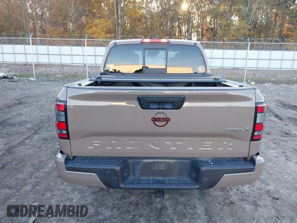 2022 Nissan Frontier SV z VIN 1N6ED1EJ3NN648912, wystawiony jako IAAI lot #40888927 z przebiegiem 59 633 mil mil oraz . Historia ofert i sprzedaży dostępna na DreamBid. Obrazek 17.