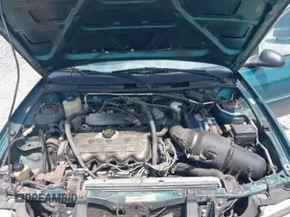 1997 Ford Escort LX with VIN 1FALP13P8VW184766, listed as a IAAI auction lot 40039873 with 104,604 mi miles. Bid and sale history available at carsss.com. Image 10.