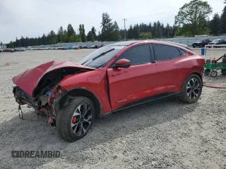 2021 Ford Mustang Mach-E Premium z VIN 3FMTK3SU1MMA10687, wystawiony jako Copart lot #56431015 z przebiegiem Nie podano mil oraz Szkoda całkowita • Salvage title. Historia ofert i sprzedaży dostępna na DreamBid. Obrazek 1.