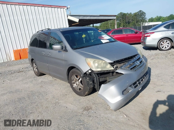 2007 Honda Odyssey EX-L z VIN 5FNRL38757B055931, wystawiony jako IAAI lot #42240198 z przebiegiem 186 954 mil mil oraz . Historia ofert i sprzedaży dostępna na DreamBid. Obrazek 1.