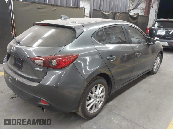 2015 Mazda 3 i Touring with VIN JM1BM1L75F1259985, listed as a IAAI auction lot 41067447 with 104,865 mi miles and . Bid and sale history available at carsss.com. Image 4.