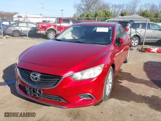 2015 Mazda Mazda6 i Sport with VIN JM1GJ1U57F1193936, listed as a IAAI auction lot 41816593 with 147,751 mi miles. Bid and sale history available at carsss.com. Image 2.