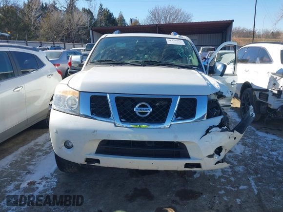 2015 Nissan Armada Platinum z VIN 5N1BA0NF7FN611136, wystawiony jako IAAI lot #41375085 z przebiegiem 130 819 mil mil oraz . Historia ofert i sprzedaży dostępna na DreamBid. Obrazek 12.
