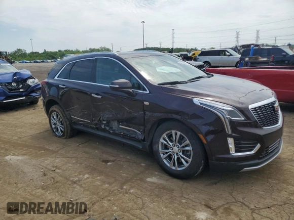 2021 Cadillac XT5 FWD Premium Luxury with VIN 1GYKNCRS9MZ217560, listed as a Copart auction lot 60733295 with 52,242 mi miles and Salvage title. Bid and sale history available at DreamBid. Image 4.