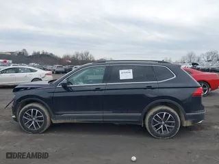 2021 Volkswagen Tiguan SE with VIN 3VV2B7AX0MM049291, listed as a IAAI auction lot 41910106 with 68,468 mi miles. Bid and sale history available at carsss.com. Image 14.