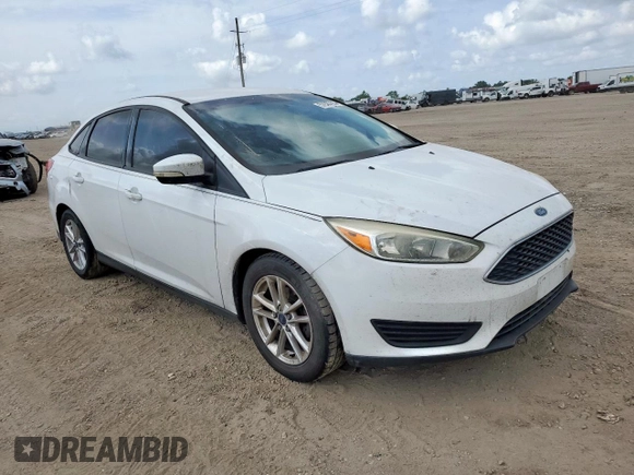 2016 Ford Focus SE with VIN 1FADP3F23GL336750, listed as a Copart auction lot 57972795 with 113,990 mi miles and Salvage title. Bid and sale history available at DreamBid. Image 4.