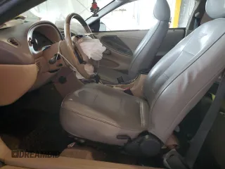 2003 Ford Mustang Standard z VIN 1FAFP404X3F342630, wystawiony jako Copart lot #66846924 z przebiegiem 191 297 mil mil oraz Szkoda całkowita • Salvage title. Historia ofert i sprzedaży dostępna na DreamBid. Obrazek 7.