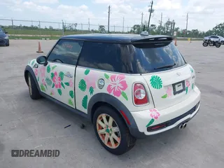 2012 MINI Hardtop S with VIN WMWSV3C54CTY17815, listed as a IAAI auction lot 42061906 with 72,393 mi miles and . Bid and sale history available at DreamBid. Image 3.