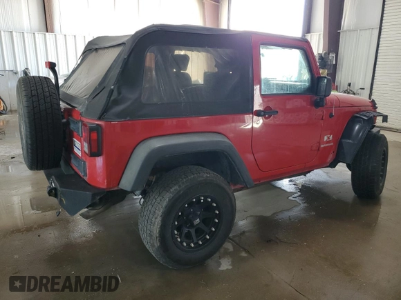 2009 Jeep Wrangler X с VIN 1J4FA24179L734789, выставлен на аукционе Copart как лот 54131245 с пробегом 98 239 миль миль и Списание • Salvage title. История ставок и продаж доступна на DreamBid. Изображение 3.