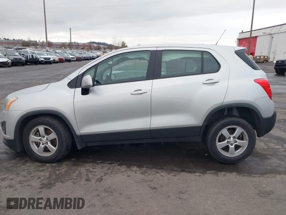 2015 Chevrolet Trax LS with VIN 3GNCJPSBXFL256473, listed as a IAAI auction lot 41130809 with 106,923 mi miles and . Bid and sale history available at DreamBid. Image 14.