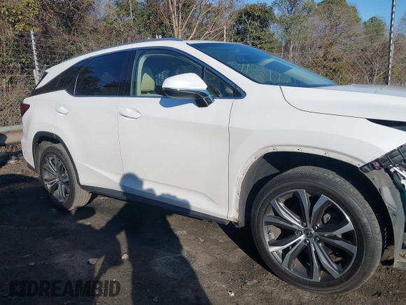 2019 Lexus RX 350L Premium with VIN JTJDZKCA0K2019725, listed as a IAAI auction lot 41303759 with 89,848 mi miles and . Bid and sale history available at DreamBid. Image 13.