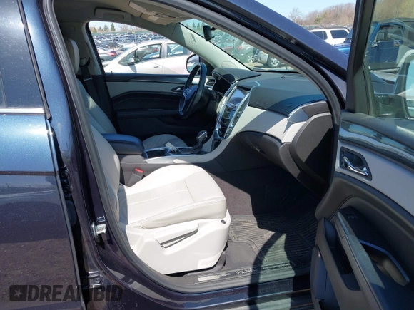 2015 Cadillac SRX with VIN 3GYFNAE39FS571065, listed as a IAAI auction lot 42029749 with 146,098 mi miles and . Bid and sale history available at DreamBid. Image 5.
