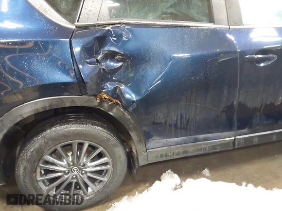2020 Mazda CX-5 Touring z VIN JM3KFBCM9L0843045, wystawiony jako IAAI lot #41361008 z przebiegiem 76 107 mil mil oraz . Historia ofert i sprzedaży dostępna na DreamBid. Obrazek 6.