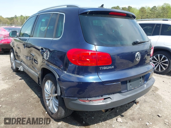 2012 Volkswagen Tiguan S with VIN WVGBV7AX3CW571039, listed as a IAAI auction lot 41928361 with 165,938 mi miles and . Bid and sale history available at DreamBid. Image 3.