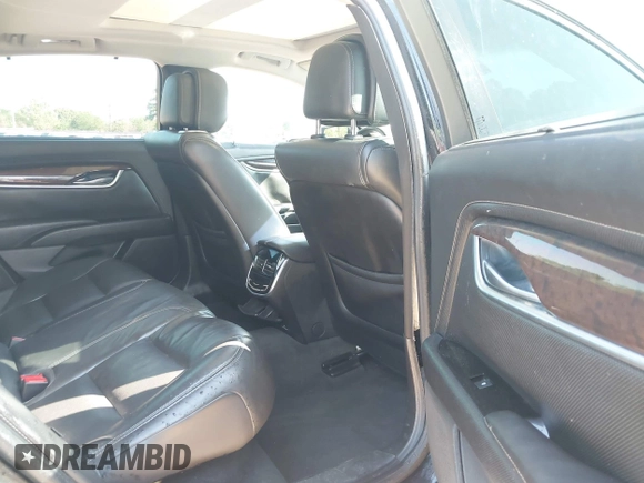 2013 Cadillac XTS Premium z VIN 2G61S5S34D9127996, wystawiony jako IAAI lot #41978539 z przebiegiem 185 157 mil mil oraz . Historia ofert i sprzedaży dostępna na DreamBid. Obrazek 8.