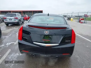 2014 Cadillac ATS Luxury AWD z VIN 1G6AH5SX0E0196052, wystawiony jako IAAI lot #41995886 z przebiegiem 97 531 mil mil oraz . Historia ofert i sprzedaży dostępna na DreamBid. Obrazek 16.