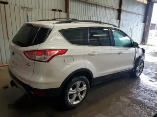 2013 Ford Escape SE z VIN 1FMCU9G96DUC02216, wystawiony jako Copart lot #63431115 z przebiegiem 186 614 mil mil oraz Szkoda całkowita • Salvage title. Historia ofert i sprzedaży dostępna na DreamBid. Obrazek 3.