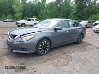 2018 Nissan Altima SR with VIN 1N4AL3AP6JC267111, listed as a IAAI auction lot 42070413 with 117,954 mi miles and . Bid and sale history available at carsss.com. Image 17.