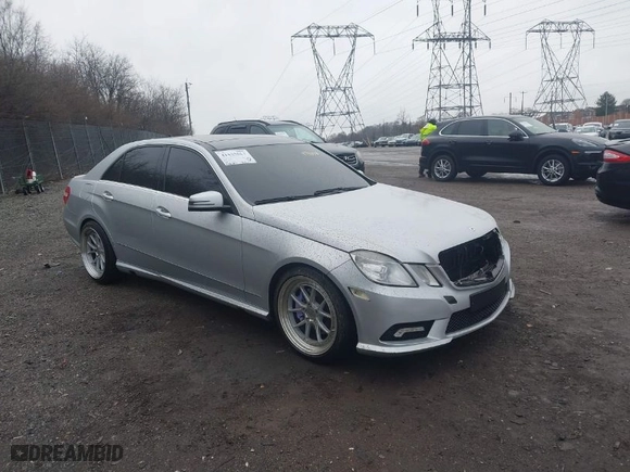 2011 Mercedes-Benz E-Class E 350 Luxury with VIN WDDHF5GB9BA499003, listed as a IAAI auction lot 41533557 with 112,164 mi miles. Bid and sale history available at carsss.com. Image 1.