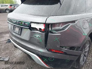 2019 Land Rover Range Rover Velar R-Dynamic SE z VIN SALYL2EX1KA227926, wystawiony jako IAAI lot #42353130 z przebiegiem 39 890 mil mil oraz . Historia ofert i sprzedaży dostępna na DreamBid. Obrazek 18.